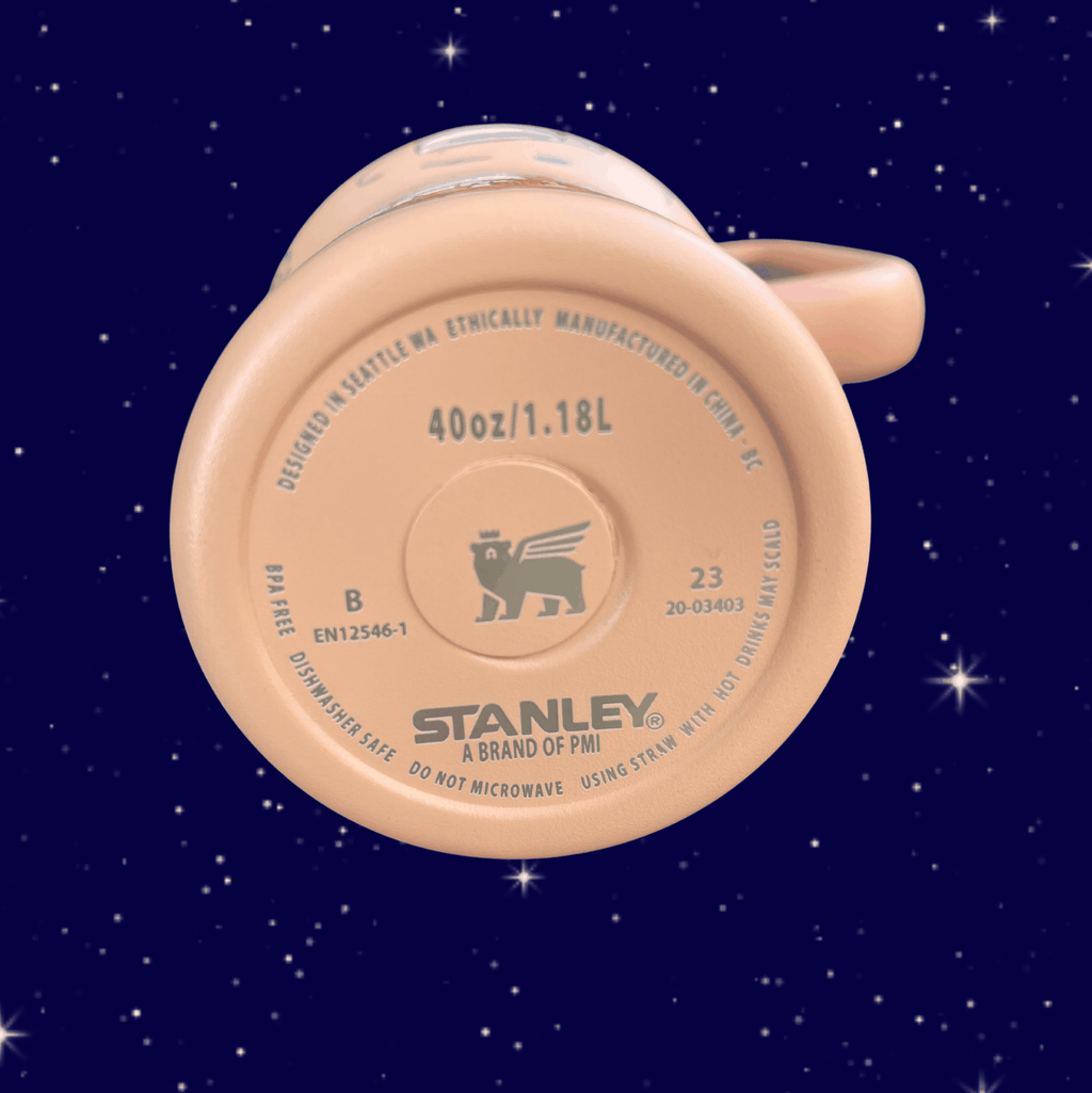 Snoopy Space 40 oz tumbler with handle, blue and purple engraved stainless steel mug on starry background