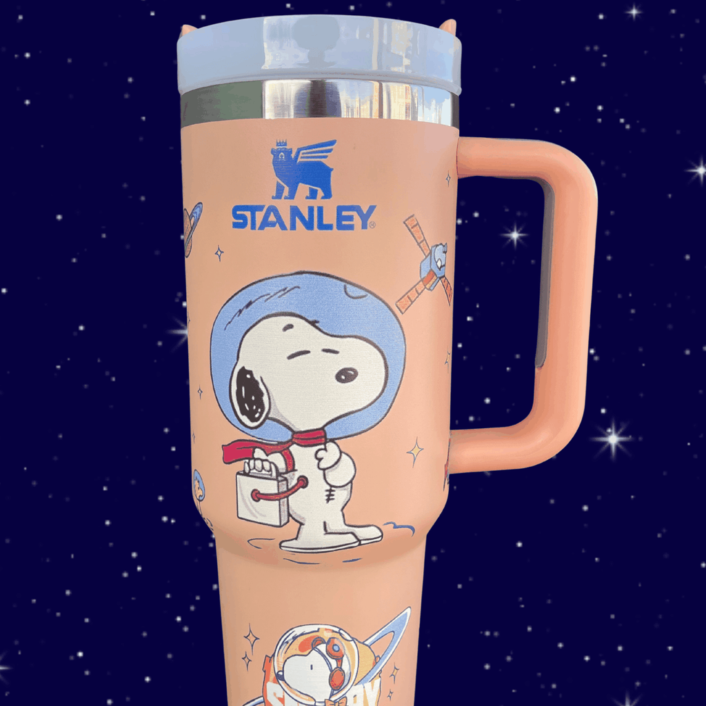 Snoopy Space 40 oz tumbler with handle, blue and purple engraved stainless steel mug on starry background
