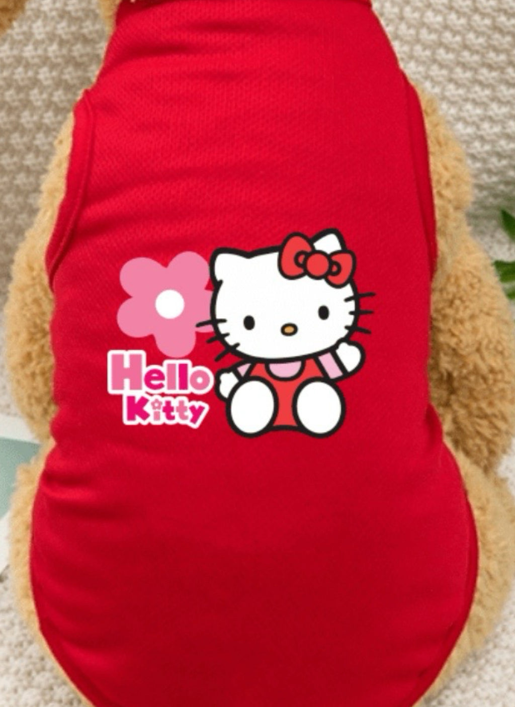 Red pet shirt with Hello Kitty design on a dog