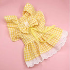 Sunny yellow gingham dress for dogs with eyelet lace trim and front bow detail
