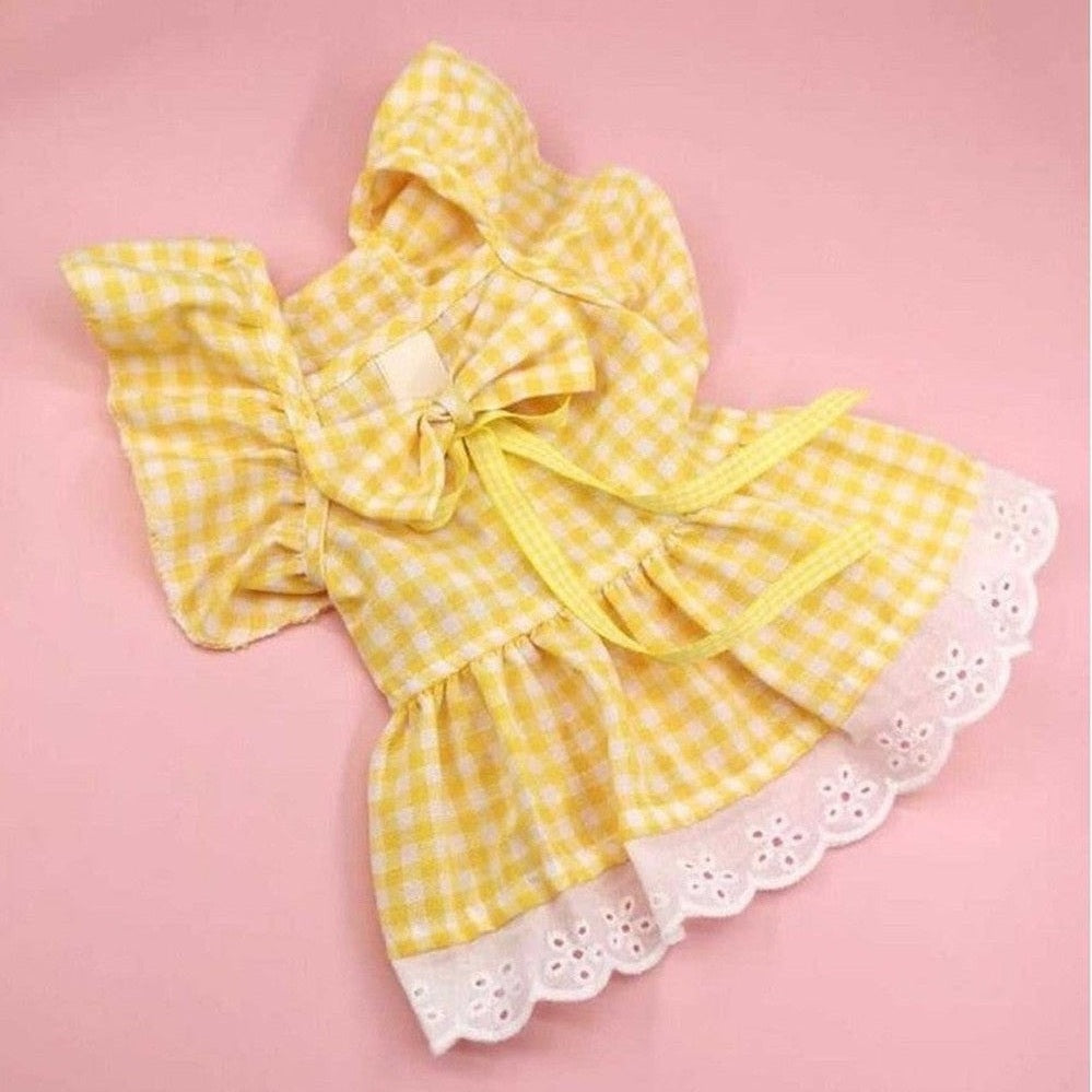 Sunny yellow gingham dress for dogs with eyelet lace trim and front bow detail