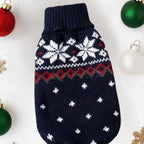 Navy blue snowflake dog sweater flat lay showing Fair Isle holiday knit with red hearts pattern