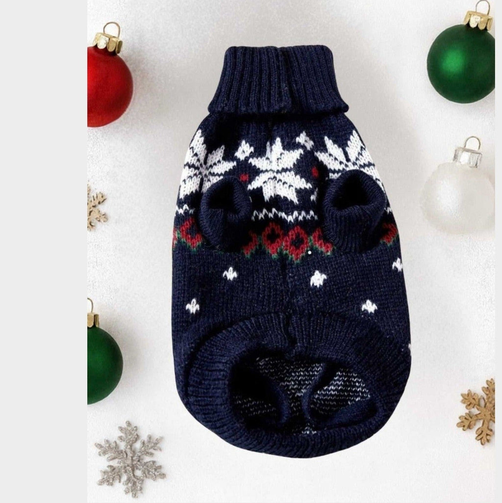 Close-up detail of navy blue snowflake dog sweater showing festive Nordic knit texture and pattern