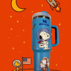 Snoopy Space 40 oz tumbler with handle, blue engraved stainless steel mug on starry background