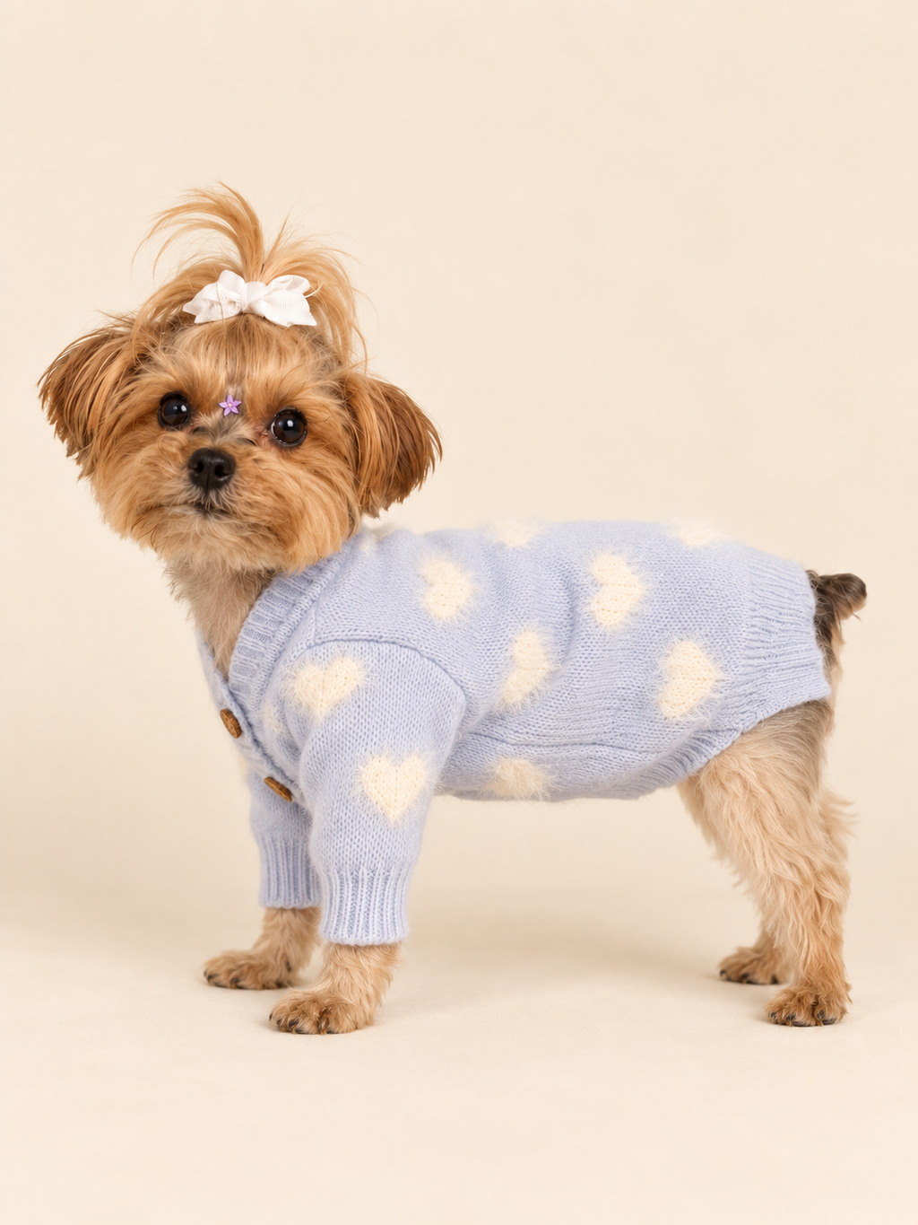 Keka wearing the Cloud Blue Dog Cardigan, side view showing fit and fuzzy heart pattern