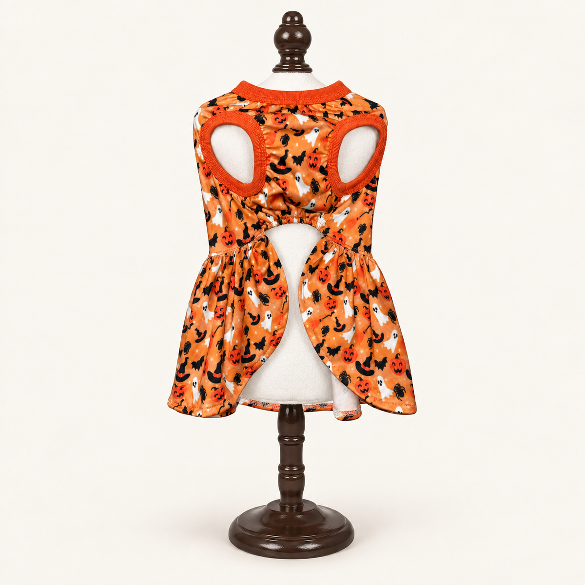 Fab-Boo-Lous Halloween Harness Dress for small dogs, rear view on espresso display stand