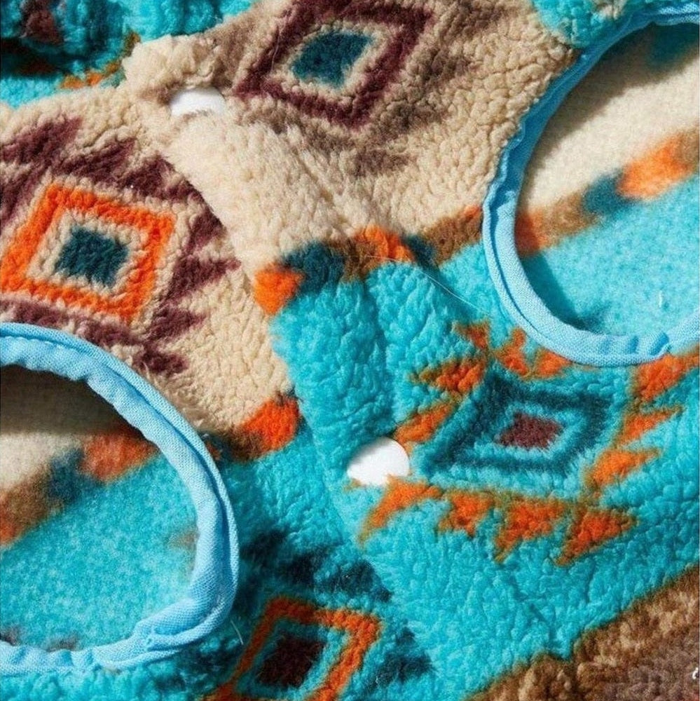 Close-up of turquoise and brown tribal fabric on Aztec Fleece Dog Hoodie.