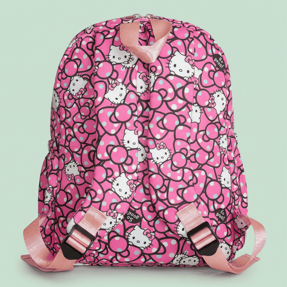 Hello Kitty pink backpack with all-over bow pattern and rose gold accents on mint green background