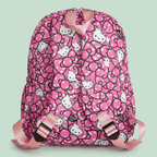 Hello Kitty pink backpack with all-over bow pattern and rose gold accents on mint green background