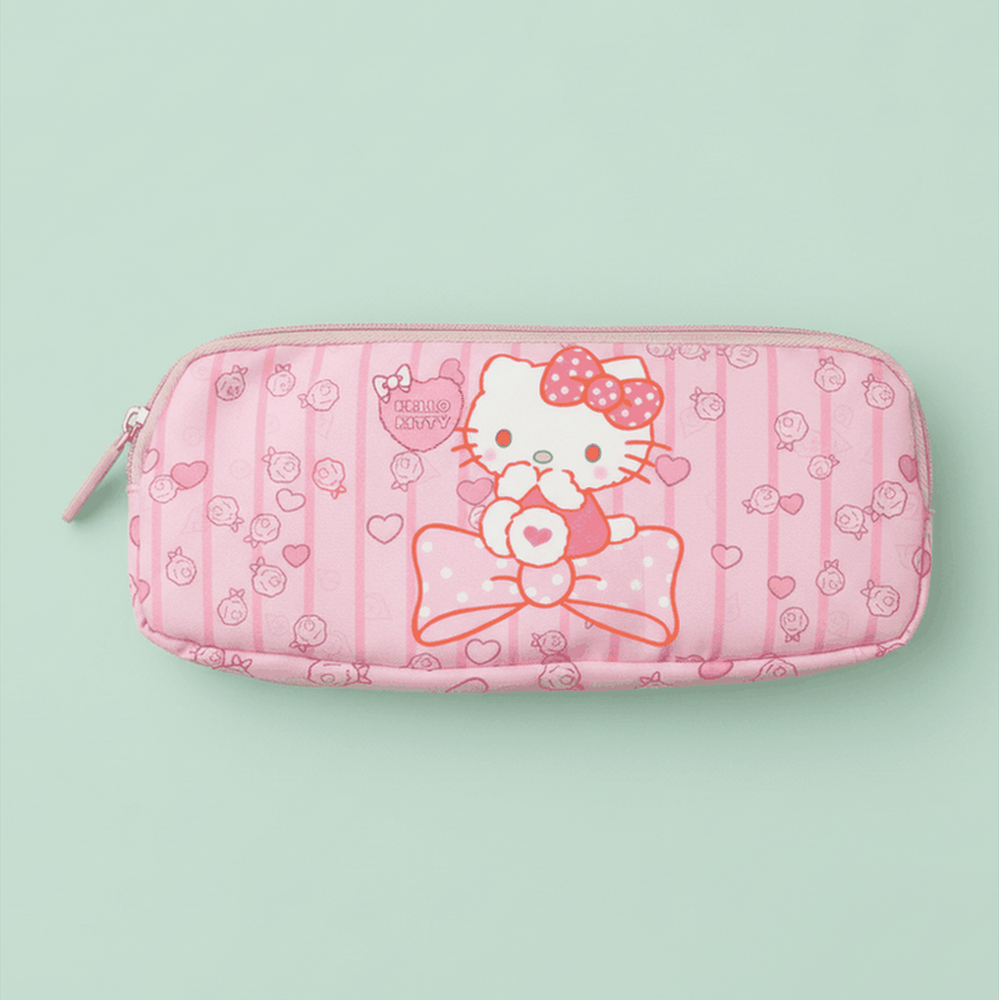 Hello Kitty pink pencil case with large Hello Kitty face, polka dot bow and rose gold zipper on mint green background