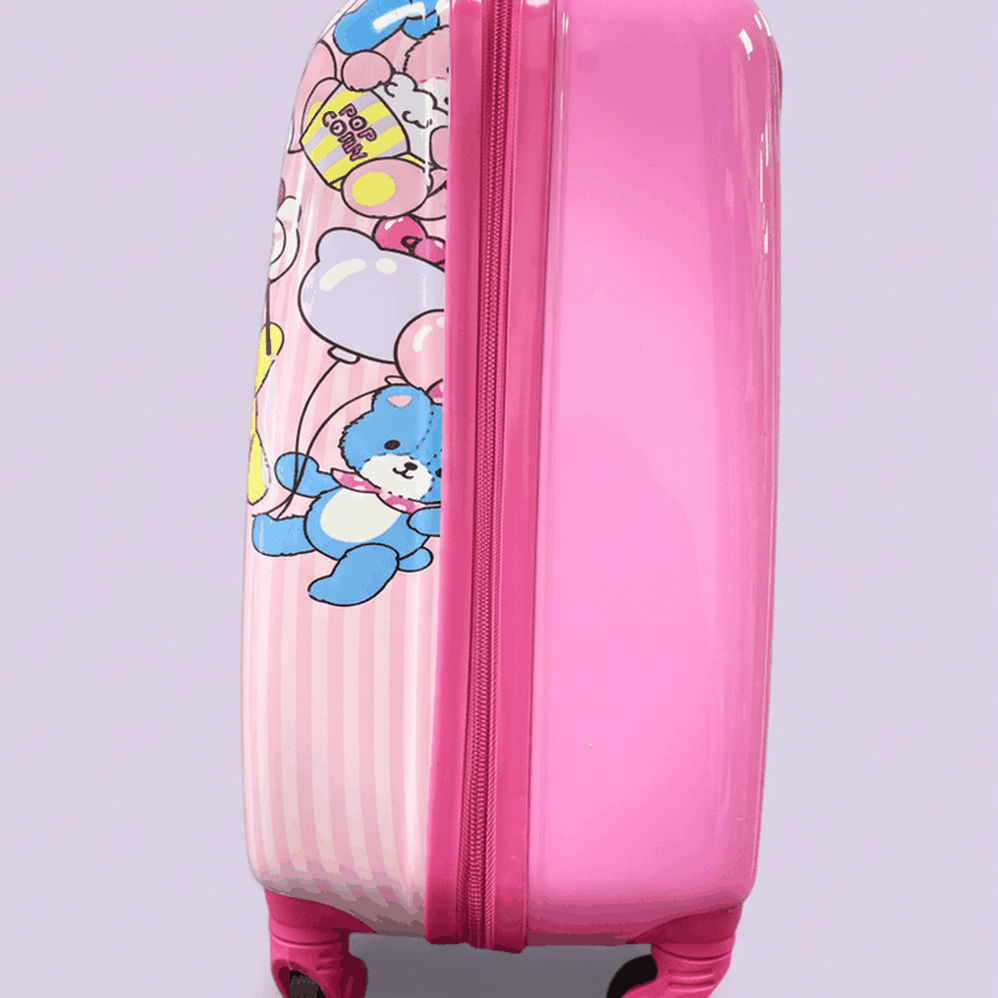 Front view of Hello Kitty pink suitcase showing Hello Kitty holding teddy bear with colorful bears on lavender background