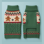 Green gingerbread dog sweater flat lay showing front and back view with cable knit and Fair Isle pattern on powder blue background