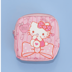 Hello Kitty lunch bag close-up showing Hello Kitty face with pink bow and hearts pattern on powder blue background