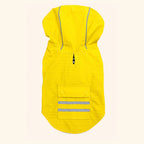 Yellow Slicker dog raincoat laid flat, back view showing the leash hole at the neck and the snap-close pocket
