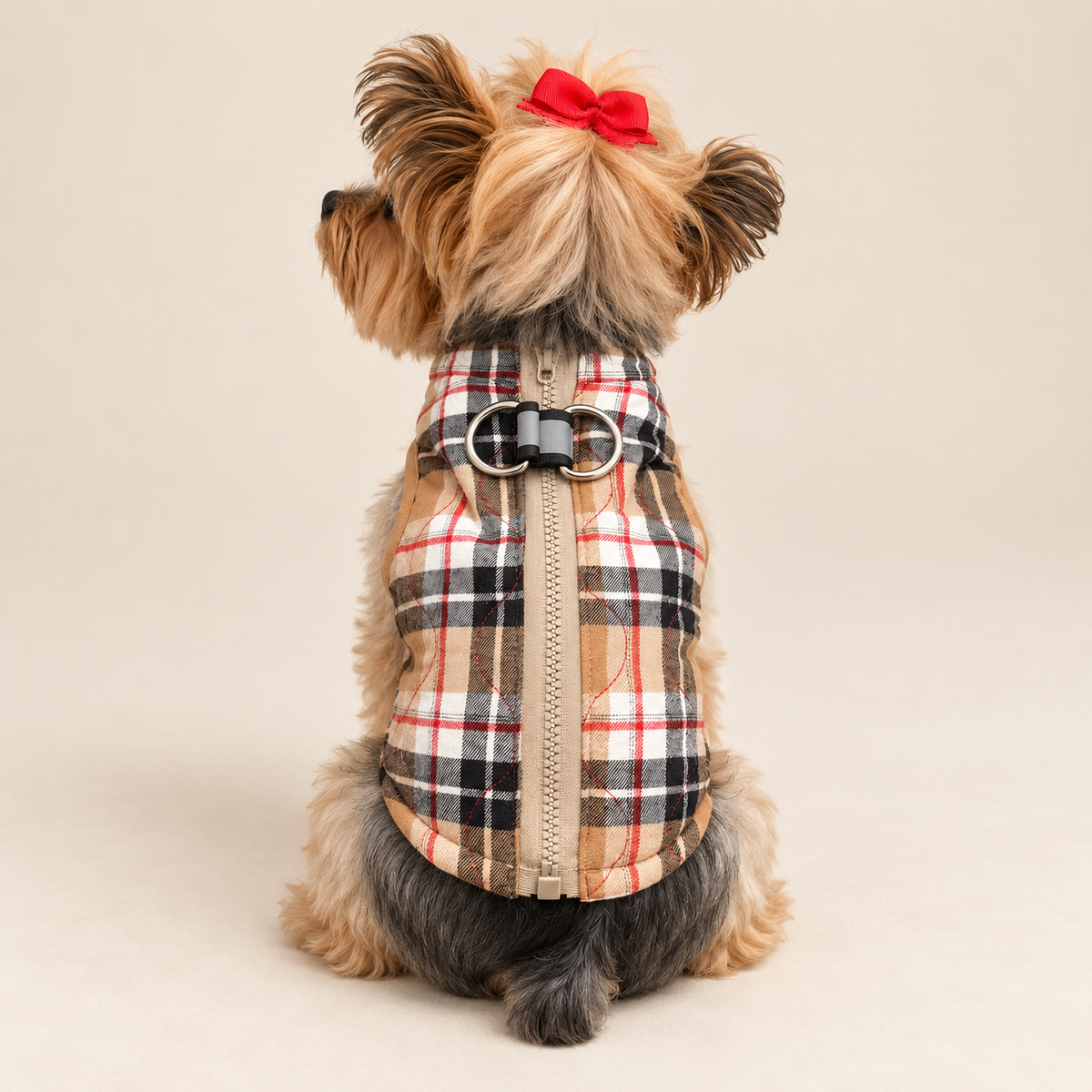 Rear view of Keka wearing the plaid harness vest with centered zipper and double D-rings